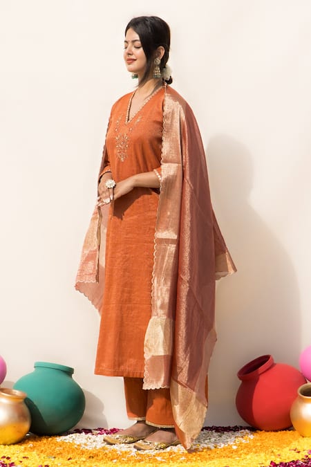 Mithi Supari Orange Tissue, Silk Embroidery, Sequins, Mirrors V-neck Kesar Kurta Pant Set Online at Aza Fashions Mithi Supari_Orange Tissue, Silk Embroidery, Sequins, Mirrors V-neck Kesar Kurta Pant Set _Online_at_Aza_Fashions