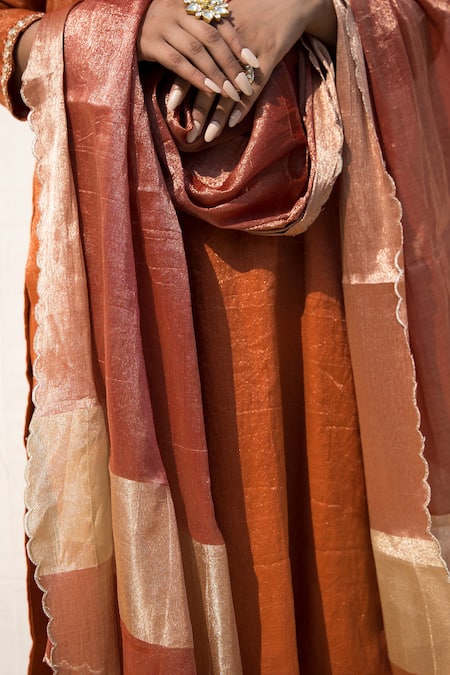 Mithi Supari Orange Tissue, Silk Embroidery, Sequins, Mirrors V-neck Kesar Kurta Pant Set at Aza Fashions Mithi Supari_Orange Tissue, Silk Embroidery, Sequins, Mirrors V-neck Kesar Kurta Pant Set _at_Aza_Fashions