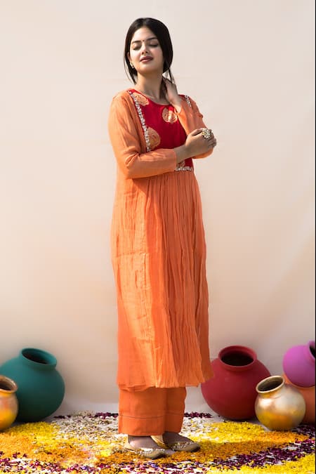 Shop Mithi Supari Orange Chanderi, Cotton Zari, Sequins Basanti Yoke Embroidered Tunic Pant Set at Aza Fashions Shop_Mithi Supari_Orange Chanderi, Cotton Zari, Sequins Basanti Yoke Embroidered Tunic Pant Set _at_Aza_Fashions