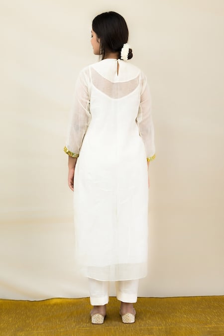 Shop Mithi Supari Ivory Chanderi, Cotton Mirrors V-neck Meer Front Gathered Tunic And Pant Set at Aza Fashions Shop_Mithi Supari_Ivory Chanderi, Cotton Mirrors V-neck Meer Front Gathered Tunic And Pant Set _at_Aza_Fashions