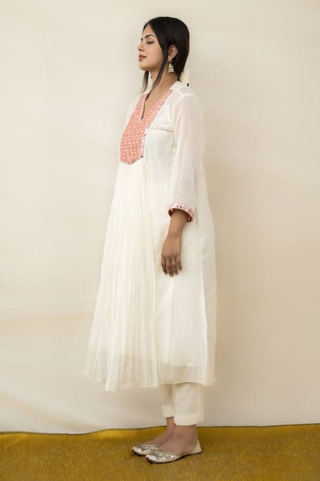 Shop Mithi Supari Ivory Chanderi Mirrors V-neck Meer Yoke Embroidered Tunic And Pant Set at Aza Fashions Shop_Mithi Supari_Ivory Chanderi Mirrors V-neck Meer Yoke Embroidered Tunic And Pant Set _at_Aza_Fashions