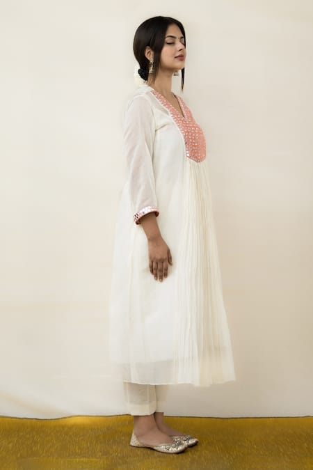 Mithi Supari Ivory Chanderi Mirrors V-neck Meer Yoke Embroidered Tunic And Pant Set Online at Aza Fashions Mithi Supari_Ivory Chanderi Mirrors V-neck Meer Yoke Embroidered Tunic And Pant Set _Online_at_Aza_Fashions