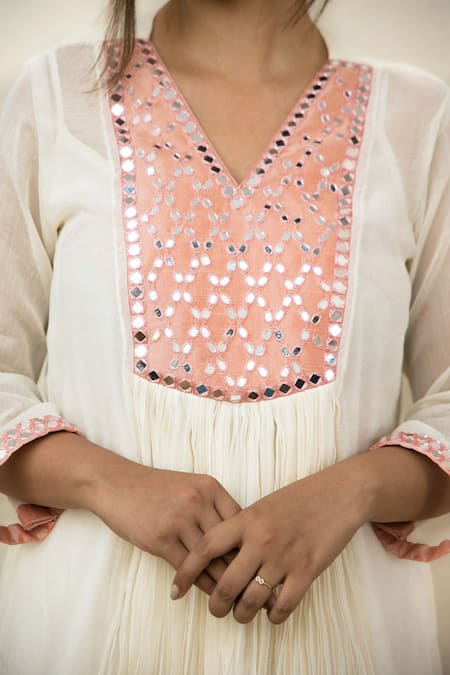 Mithi Supari Ivory Chanderi Mirrors V-neck Meer Yoke Embroidered Tunic And Pant Set at Aza Fashions Mithi Supari_Ivory Chanderi Mirrors V-neck Meer Yoke Embroidered Tunic And Pant Set _at_Aza_Fashions