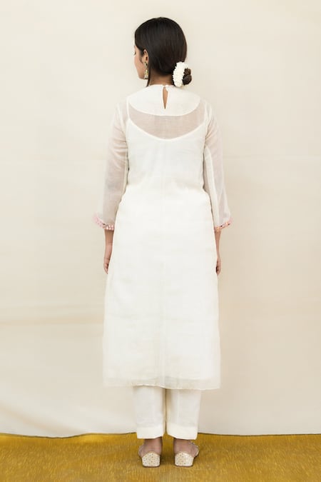 Shop Mithi Supari Ivory Chanderi Mirrors V-neck Meer Yoke Work Tunic And Pant Set at Aza Fashions Shop_Mithi Supari_Ivory Chanderi Mirrors V-neck Meer Yoke Work Tunic And Pant Set _at_Aza_Fashions