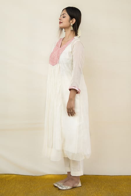 Mithi Supari Ivory Chanderi Mirrors V-neck Meer Yoke Work Tunic And Pant Set Online at Aza Fashions Mithi Supari_Ivory Chanderi Mirrors V-neck Meer Yoke Work Tunic And Pant Set _Online_at_Aza_Fashions