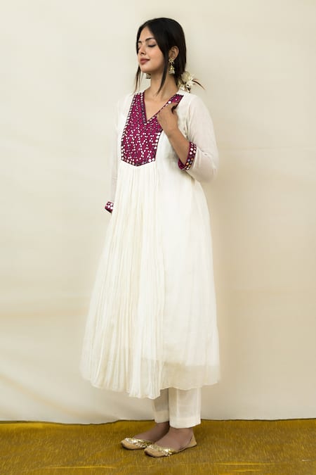 Mithi Supari Ivory Chanderi Mirrors V-neck Meer Yoke Embroidered Tunic Pant Set Online at Aza Fashions Mithi Supari_Ivory Chanderi Mirrors V-neck Meer Yoke Embroidered Tunic Pant Set _Online_at_Aza_Fashions