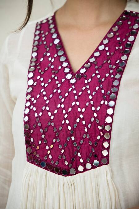 Mithi Supari Ivory Chanderi Mirrors V-neck Meer Yoke Embroidered Tunic Pant Set at Aza Fashions Mithi Supari_Ivory Chanderi Mirrors V-neck Meer Yoke Embroidered Tunic Pant Set _at_Aza_Fashions