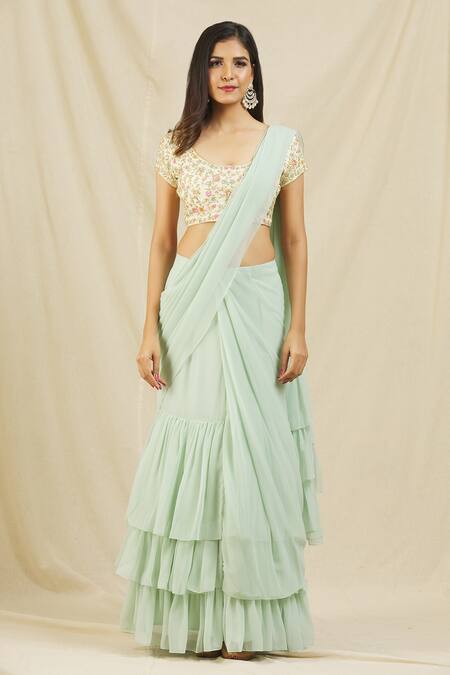 Rohini Bedi_Green Georgette Embroidered Zardozi Work Round Neck Ruffle Saree And Blouse Set _at_Aza_Fashions