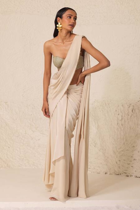 Buy Chhaya Mehrotra Off White , Satin Pre-draped Godet Saree With Embellished Bustier Online at Aza Fashions Buy_Chhaya Mehrotra_Off White , Satin Pre-draped Godet Saree With Embellished Bustier _Online_at_Aza_Fashions