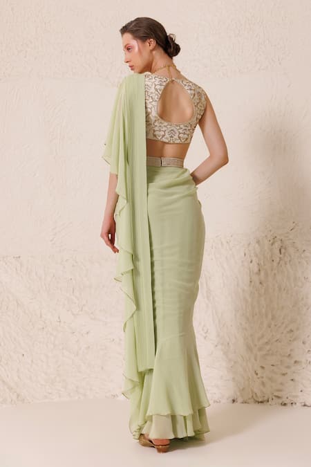 Shop Chhaya Mehrotra Green Silk Rhinestones Pre-draped Ruffle Trim Saree With Embellished Blouse at Aza Fashions Shop_Chhaya Mehrotra_Green Silk Rhinestones Pre-draped Ruffle Trim Saree With Embellished Blouse _at_Aza_Fashions