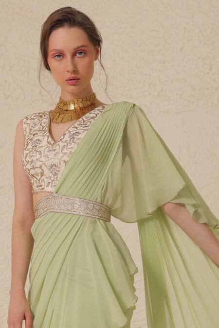 Shop Chhaya Mehrotra Green Silk Rhinestones Pre-draped Ruffle Trim Saree With Embellished Blouse Online at Aza Fashions Shop_Chhaya Mehrotra_Green Silk Rhinestones Pre-draped Ruffle Trim Saree With Embellished Blouse _Online_at_Aza_Fashions