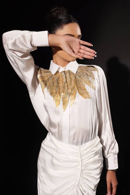 Buy Kyra By Nina + Deepika Ivory Modal, Satin Feathers Collared Cleopatra Hand Painted Top With Skirt Online at Aza Fashions Buy_Kyra By Nina + Deepika_Ivory Modal, Satin Feathers Collared Cleopatra Hand Painted Top With Skirt _Online_at_Aza_Fashions