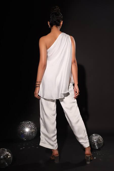 Shop Kyra By Nina + Deepika Ivory Embroidery One Shoulder The White Goddess Hand Painted Top And Pant Set at Aza Fashions Shop_Kyra By Nina + Deepika_Ivory Embroidery One Shoulder The White Goddess Hand Painted Top And Pant Set _at_Aza_Fashions