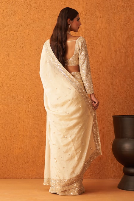 Shop Angad Singh Gold Tissue Sequins, Pearls, Crystals Border Embroidered Saree With Blouse at Aza Fashions Shop_Angad Singh_Gold Tissue Sequins, Pearls, Crystals Border Embroidered Saree With Blouse _at_Aza_Fashions