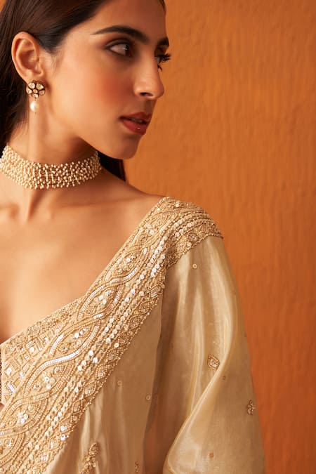 Shop Angad Singh Gold Tissue Sequins, Pearls, Crystals Border Embroidered Saree With Blouse Online at Aza Fashions Shop_Angad Singh_Gold Tissue Sequins, Pearls, Crystals Border Embroidered Saree With Blouse _Online_at_Aza_Fashions