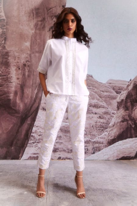 Shop_Dash And Dot_Ivory Polyester, Viscose, Spandex Embroidery Floral Tapered Pants_Online_at_Aza_Fashions