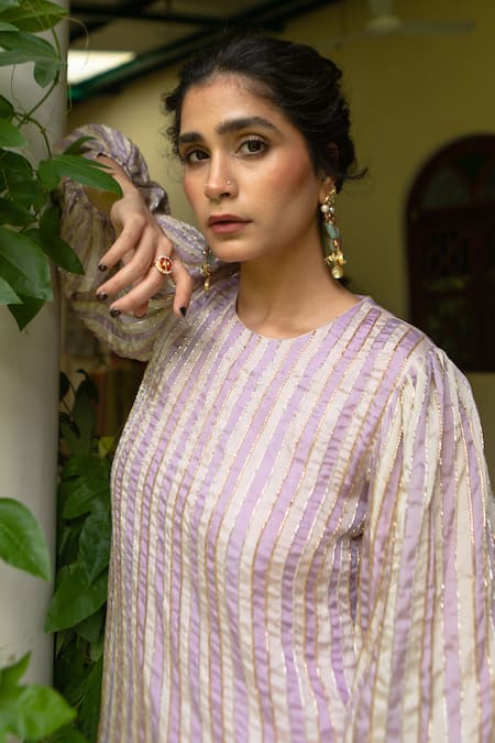 EASE Purple Satin, Crepe Cut Work Round Neck Striped Pattern Kurta And Dhoti Set at Aza Fashions EASE_Purple Satin, Crepe Cut Work Round Neck Striped Pattern Kurta And Dhoti Set _at_Aza_Fashions