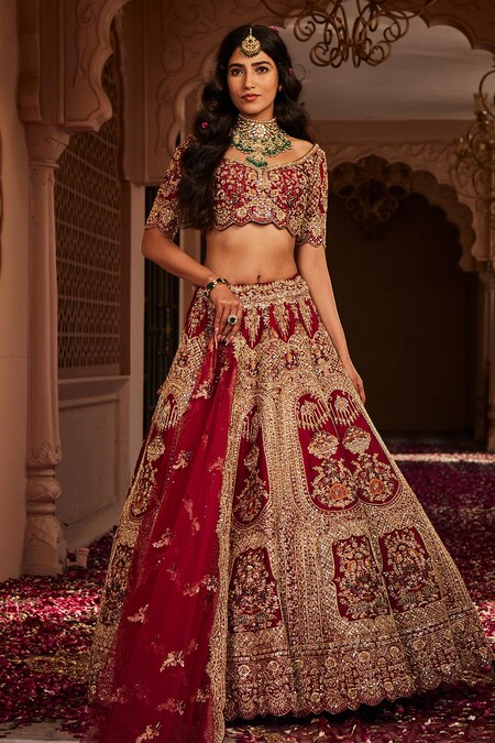 Mahogany - The Design Couture - The sophisticated broad neck pattern of the  blouse matched with the flowery resham work on lehenga culminates into an  attire of exquisite tastes. The simplicity of