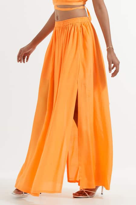 The Indian Cause_Orange Silk Shawl Neck Wrap Top And Side Slit Skirt_at_Aza_Fashions