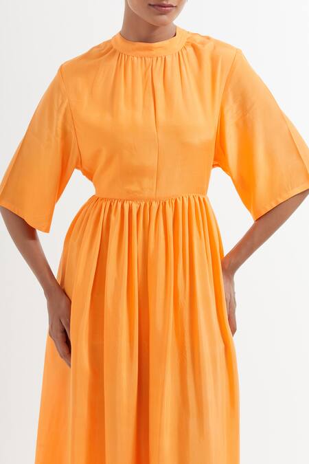 The Indian Cause_Orange Silk Bandeau Neck Flared Sleeve Maxi Dress_at_Aza_Fashions