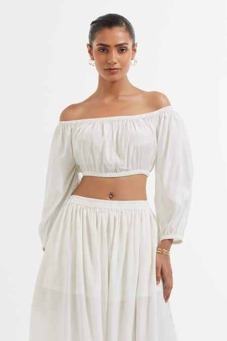 Buy The Indian Cause White Silk Shawl Neck Off Shoulder Crop Top And Skirt Online at Aza Fashions Buy_The Indian Cause_White Silk Shawl Neck Off Shoulder Crop Top And Skirt_Online_at_Aza_Fashions