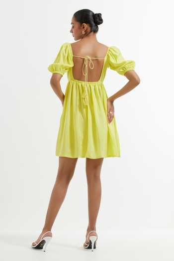 Buy Yellow Silk Round Neck Solid Fit And Flare Dress For Women by The Indian Cause Online at Aza Fashions. Buy Yellow Silk Round Neck Solid Fit And Flare Dress For Women by The Indian Cause Online at Aza Fashions.