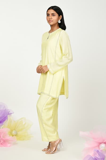 Shop Komal Shah Yellow Silk Embroidery Keyhole Neck Hira Chaav Neckline Top And Pant Set Online at Aza Fashions Shop_Komal Shah_Yellow Silk Embroidery Keyhole Neck Hira Chaav Neckline Top And Pant Set _Online_at_Aza_Fashions