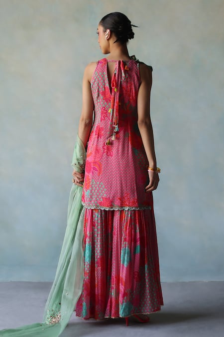 Shop Rajiramniq Pink Crepe Print Floral V Neck Vivid Kurta Gharara Set at Aza Fashions Shop_Rajiramniq_Pink Crepe Print Floral V Neck Vivid Kurta Gharara Set _at_Aza_Fashions