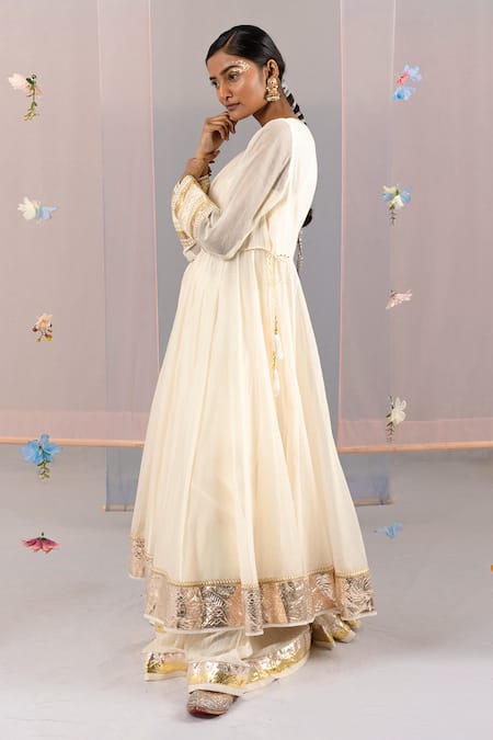 Shop Kyra By Bhavna Ivory Chanderi Gota Patti, Lace V-neck Sleeve Embroidered Anarkali Set at Aza Fashions Shop_Kyra By Bhavna_Ivory Chanderi Gota Patti, Lace V-neck Sleeve Embroidered Anarkali Set _at_Aza_Fashions