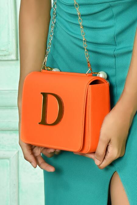 Samyukta Singhania_Orange Acrylic Monogram And Pearl Embellished D - Initial Box Sling Bag_at_Aza_Fashions