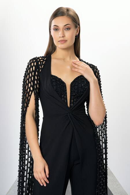 Eli Bitton Black Rayon, Nylon, Spandex, Polyester Embroidery Lizette Cape Sleeve Jumpsuit at Aza Fashions Eli Bitton_Black Rayon, Nylon, Spandex, Polyester Embroidery Lizette Cape Sleeve Jumpsuit _at_Aza_Fashions