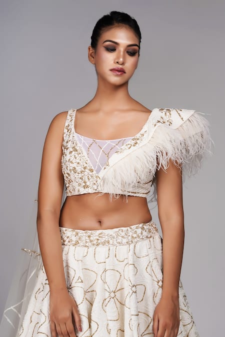 Shruti S_Off White Net Sequins, Zari Square Floral Bloom Embroidered Lehenga With Blouse _at_Aza_Fashions
