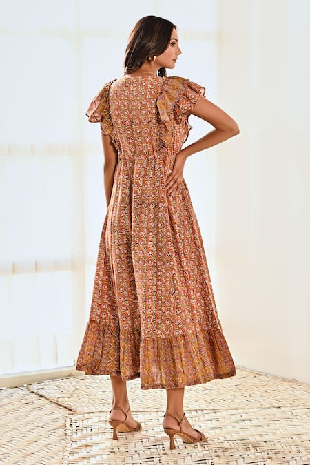 Shop Moontara Orange Cotton V-neck Printed Ruffle Yoke Tiered Dress at Aza Fashions Shop_Moontara_Orange Cotton V-neck Printed Ruffle Yoke Tiered Dress _at_Aza_Fashions