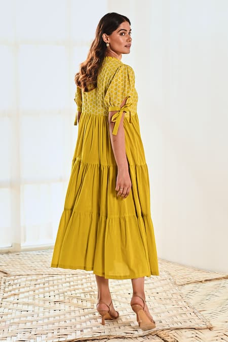 Shop_Moontara_Yellow Cotton Tassels V-neck Tie-up Sleeve Dress _at_Aza_Fashions