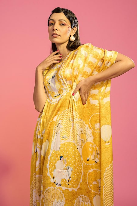The Boozy Button Yellow Silk Round Neck Temple Print Pleated Kaftan at Aza Fashions The Boozy Button_Yellow Silk Round Neck Temple Print Pleated Kaftan_at_Aza_Fashions