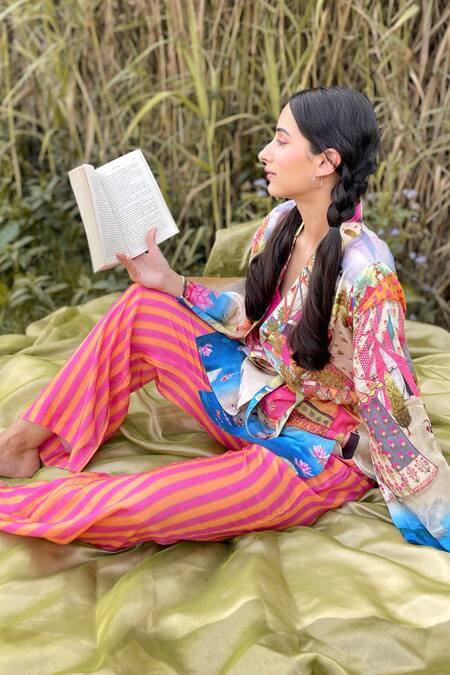 The Boozy Button Multi Color Silk Collared Carnival Print Wrap Top And Pant Set at Aza Fashions The Boozy Button_Multi Color Silk Collared Carnival Print Wrap Top And Pant Set_at_Aza_Fashions