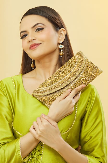 Shop_Nazaakat By Samara Singh_Gold Cut Work Curved Cutdana Embellished Pattern Clutch _Online_at_Aza_Fashions