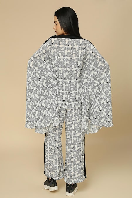 Shop Neha Gursahani Black Viscose Boat Neck Fish Print Kaftan And Pant Set at Aza Fashions Shop_Neha Gursahani_Black Viscose Boat Neck Fish Print Kaftan And Pant Set _at_Aza_Fashions