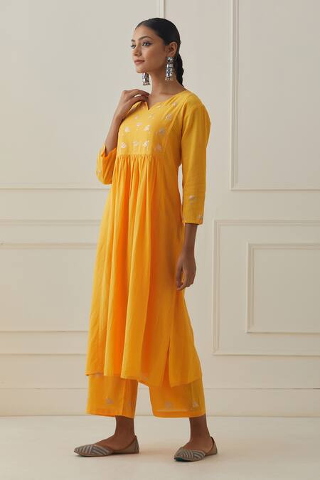 Kamaltaas Yellow Cotton Embroidery Split V-neck Yoke Kurta And Pant Set at Aza Fashions Kamaltaas_Yellow Cotton Embroidery Split V-neck Yoke Kurta And Pant Set _at_Aza_Fashions