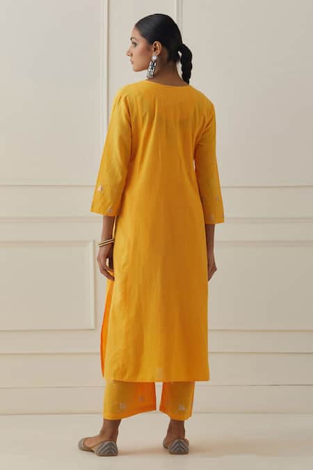 Shop Kamaltaas Yellow Cotton Embroidery Split V-neck Yoke Kurta Pant Set at Aza Fashions Shop_Kamaltaas_Yellow Cotton Embroidery Split V-neck Yoke Kurta Pant Set _at_Aza_Fashions