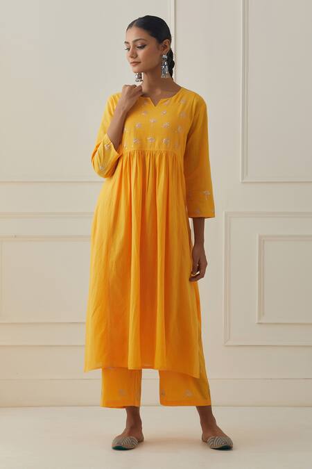 Shop Kamaltaas Yellow Cotton Embroidery Split V-neck Yoke Kurta Pant Set Online at Aza Fashions Shop_Kamaltaas_Yellow Cotton Embroidery Split V-neck Yoke Kurta Pant Set _Online_at_Aza_Fashions