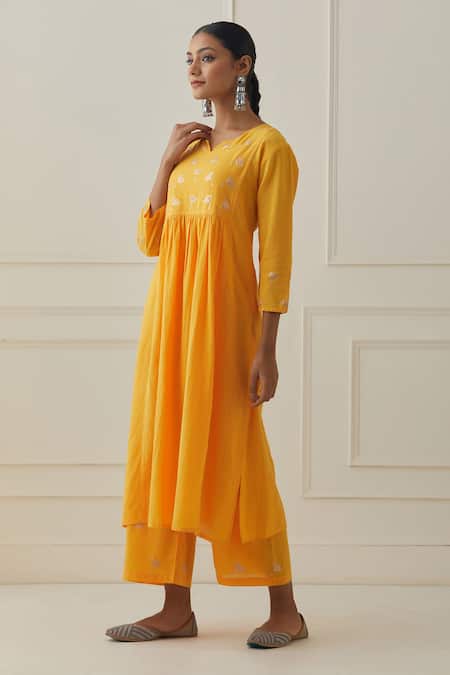 Kamaltaas Yellow Cotton Embroidery Split V-neck Yoke Kurta Pant Set at Aza Fashions Kamaltaas_Yellow Cotton Embroidery Split V-neck Yoke Kurta Pant Set _at_Aza_Fashions