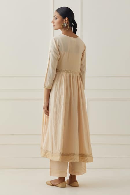 Shop Kamaltaas Peach Cotton Embroidery, Pearls Cuff Anarkali Pant Set at Aza Fashions Shop_Kamaltaas_Peach Cotton Embroidery, Pearls Cuff Anarkali Pant Set _at_Aza_Fashions