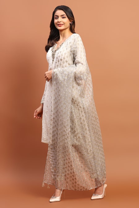 Soniya G_Ivory Georgette Sequins, Beads, Embroidery Round Neck Chikankari Kurta Pant Set _Online_at_Aza_Fashions