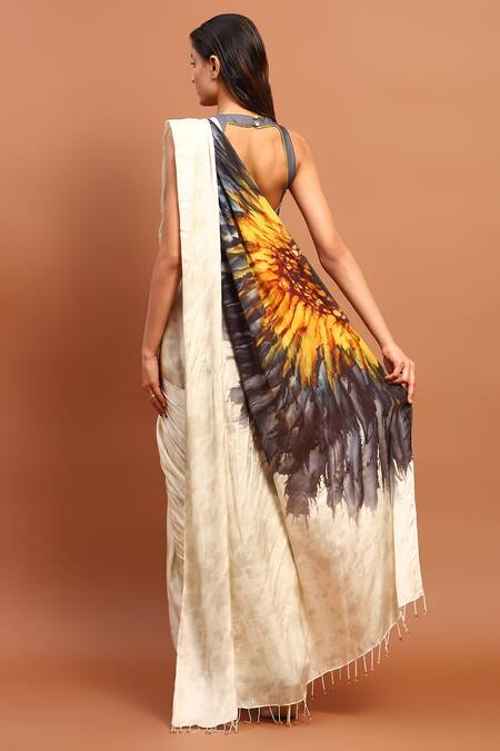 Shop Soniya G Ivory Satin Embroidery, Tassels Halter Printed Pre-draped Saree With Blouse at Aza Fashions Shop_Soniya G_Ivory Satin Embroidery, Tassels Halter Printed Pre-draped Saree With Blouse_at_Aza_Fashions