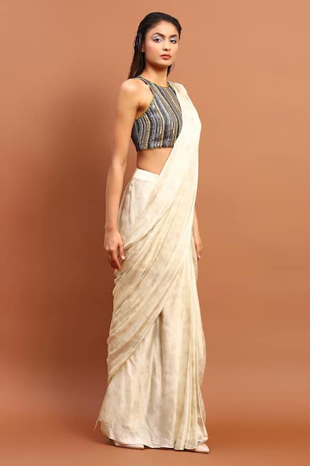 Soniya G Ivory Satin Embroidery, Tassels Halter Printed Pre-draped Saree With Blouse Online at Aza Fashions Soniya G_Ivory Satin Embroidery, Tassels Halter Printed Pre-draped Saree With Blouse_Online_at_Aza_Fashions