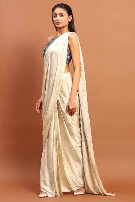 Shop Soniya G Ivory Satin Embroidery, Tassels Halter Printed Pre-draped Saree With Blouse Online at Aza Fashions Shop_Soniya G_Ivory Satin Embroidery, Tassels Halter Printed Pre-draped Saree With Blouse_Online_at_Aza_Fashions