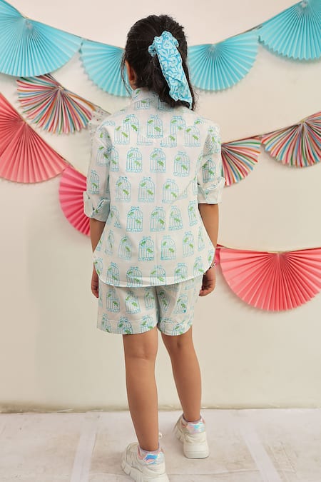 Shop Tiny Colour White Cotton Bird Print Shirt And Shorts Set at Aza Fashions Shop_Tiny Colour_White Cotton Bird Print Shirt And Shorts Set _at_Aza_Fashions