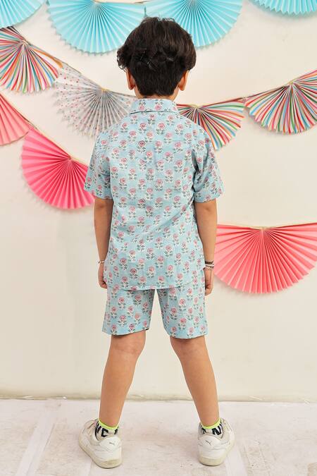 Shop Tiny Colour Blue Cotton Floral Print Shirt And Shorts Set at Aza Fashions Shop_Tiny Colour_Blue Cotton Floral Print Shirt And Shorts Set _at_Aza_Fashions