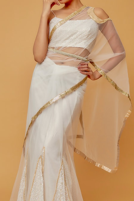 Shop Anita Kanwal White Net Embellished Sequin Cold Shoulder Pallu Pre-draped Saree With Blouse at Aza Fashions Shop_Anita Kanwal_White Net Embellished Sequin Cold Shoulder Pallu Pre-draped Saree With Blouse _at_Aza_Fashions